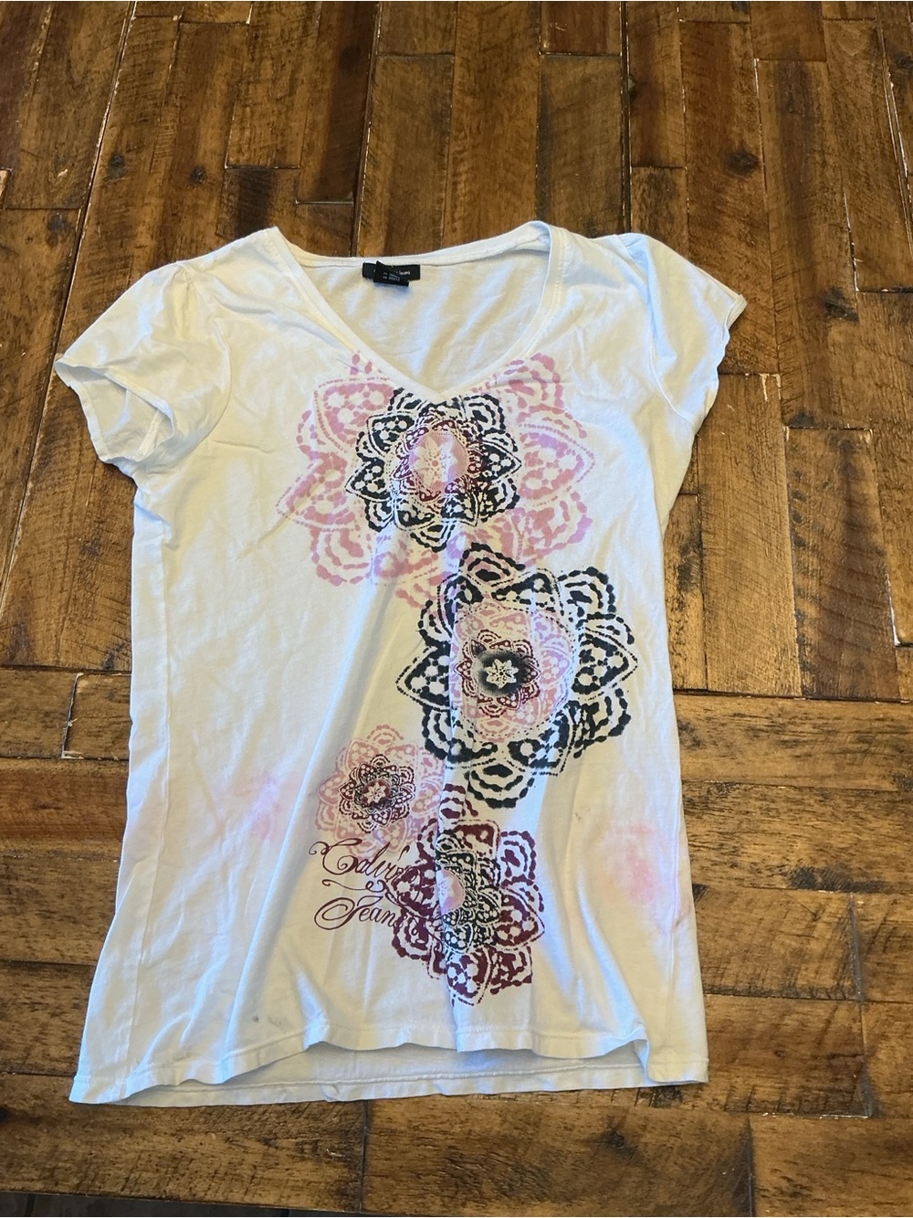 Calvin Klein Jeans White V-Neck Tee with Pink and Black Medallion Prints